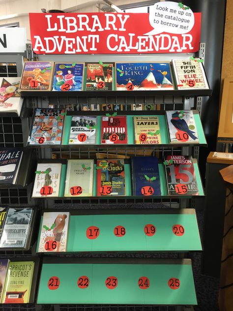 It's the library advent calendar! Each book displayed has a number from 1-25 in the title, with a new title added each day until Christmas #librarydisplay Library Book Displays December, December Library Activities, Bulletin Board Ideas For Middle School Library, Holiday Book Display Ideas, Christmas Display Library, Winter Reading Programs For Libraries, Library Advent Calendar, Library Displays Christmas, Christmas Library Activities