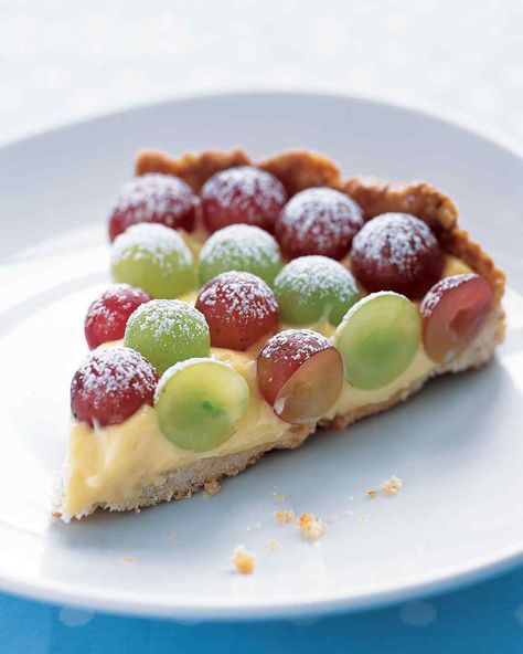 There are many varieties of grapes to choose from when making this elegant dessert. Create a pattern with the colors. We made alternating circles of seedless red and green. Grape Tart, Grape Recipes, Elegant Desserts, Fruit Pie, White Plate, Fruit Tart, Tart Recipes, Healthy Dessert, Sweet Tooth