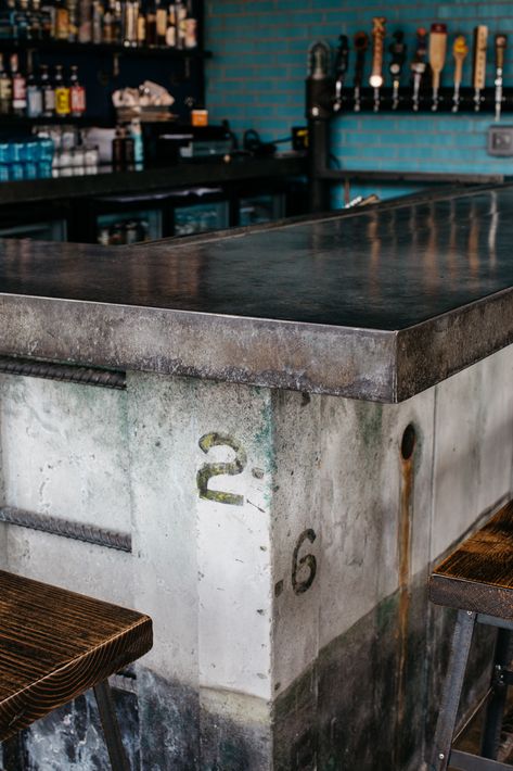 Concrete Bar Countertops, Concrete Bar Top Restaurant, Stone Bar Counter, Cement Bar Top, Rustic Industrial Bar Design, Mezcal Bar Design, Concrete Bartop, Concrete Bar Counter, Concrete Bar Design