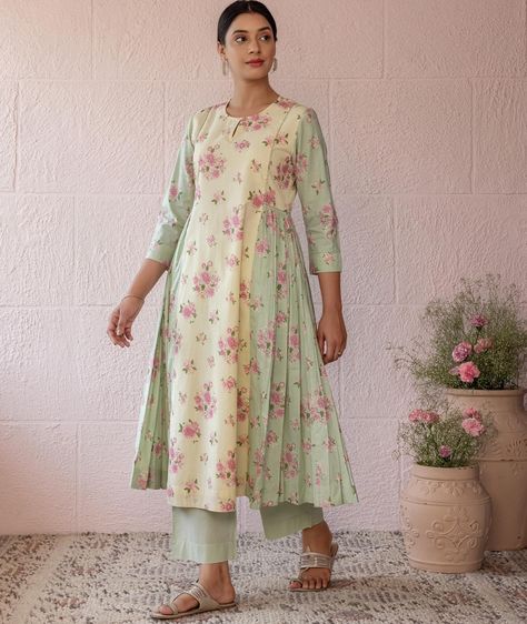 Summer 2024 - New Arrivals! Gathered rosebush kurta features two complementary colorways of the same print. Gathers at the side add volume and subtle draping. A timeless and versatile kurta, for any fashion savvy individual. Shop our Rosebush collection at store and online at www.cottonsjaipur.com [ Cottons Jaipur, Cotton, New arrival, Rose, Floral, Handmade Kurtas, Everyday-wear, Summer staples ] #cottons #cottonsjaipur #newarrivals #floral #summer #summer2024 #handcraftedkurtas #comfor... Cotton Floral Kurti, Summer Kurti Designs, Cottons Jaipur, Frocks Pattern, Pleated Outfit, Floral Kurti, Summer Kurti, Sleeveless Blouse Designs, Stylish Tunic