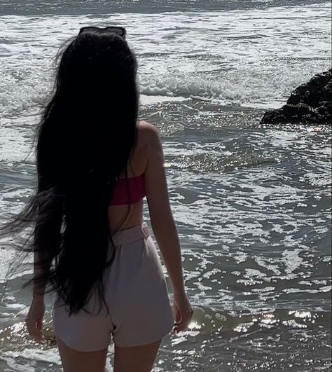 Standing on the beach in Malibu Beachy Black Hair, Water Beach Aesthetic, Long Hair Pics, Long Black Hair Aesthetic Faceless, Brunette Beach Aesthetic, Brunette At The Beach, Visiting Hawaii, Brown Hair Boy, Beachy Girl