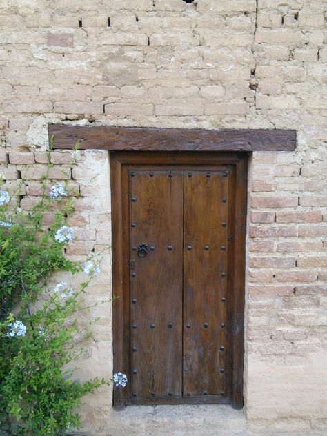 The oldest part of the Alhambra.  After the Palacio Nazaries, this seemed warm and homey. The Alhambra, Granada, Spain. Closed Doors, Door Frame, Spain Travel, Granada, Taking Pictures, Rustic House, Small House, Printmaking, Gate