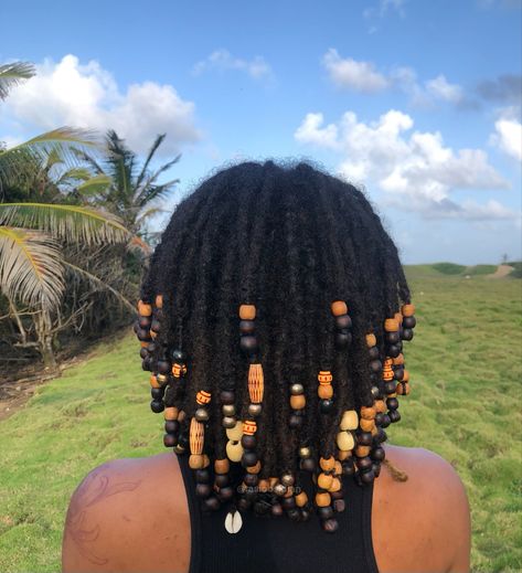 Bra  length Locs with nude coloured beads on them Dread With Beads, Locs Hairstyles With Accessories, Dreadlock Styles With Beads, Loc Styles Beads, Natural Locs With Beads, Two Strand Twist Locs With Beads, Beads With Locs, Locs With Wooden Beads, How To Put Beads On Locs