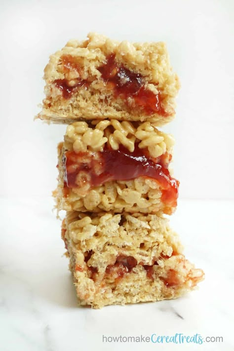 The BEST Peanut Butter and Jelly Rice Krispie Treats -- no bake! Making Rice Crispy Treats, Decorated Rice Krispie Treats, Rice Krispie Treats Variations, Rice Krispie Treats Cereal, Fun Rice Krispie Treats, Peanut Butter Rice Crispies, Krispy Treats Recipe, Peanut Butter Rice Krispie Treats, Rice Crispy Treats Recipe