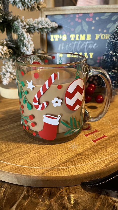 This libbey glass mug is the perfect holiday 🎄cup for all your holiday hot cocoas, peppermint mocha coffee and any holiday beverage you choose  🎄Details🎄 13oz clear glass mug  Design is made from  High quality, permanent vinyl that will withstand daily use and washings.  I strive for consistency and perfection, however, every item is hand-made with love, which means they may vary in color, size, etc.  Care Instructions:  Handmade with Love, So Handle with Care! Each cup comes with a care card Christmas Coffee Mug Ideas, Coffee Glass Cup Design Christmas, Cricut Christmas Mugs, Christmas Mugs Cricut, Christmas Cup Designs, Peppermint Mocha Coffee, Christmas Coffee Mugs, Peppermint Hot Cocoa, Holiday Mugs