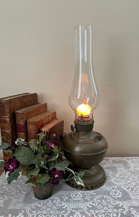 This Lighting item by MrsWintersCottage has 28 favorites from Etsy shoppers. Ships from Collegeville, PA. Listed on Mar 29, 2024 Antique Standing Lamp, Oil Lamp Aesthetic, Oil Lamps Antique, Antique Oil Lamp Decor Ideas, Antique Lamps Vintage Lighting, Alchemist Lab, Oil Lamp Decor, Oil Lamp Centerpiece, Old Oil Lamp