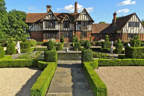 Sprawling gardens: The immaculate gardens at Flowton Priory in green Hertfordshire comes complete with a pond British Home Exterior, Brown Brick Exterior, Sims Exterior, Ancient Homes, Tudor House Exterior, Cottage Mansion, Tudor Houses, Mansion Exterior, Country Things