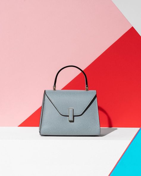 Valextra on Instagram: “The Valextra’s most #iconic #bag, the Iside, with its rigid, architectural trapeze shape, has become Valextra’s most popular model and a…” Most Popular, Kate Spade Crossbody, Product Launch, Graphic Design, Architecture, Instagram, Design