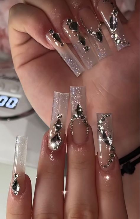 777 Classy Quince Nails, Prom Nails Extravagant, Blinged French Tip Acrylic Nails, Long Square Nails Rhinestones, Natural Acrylic Nails With Rhinestones, Long Gem Acrylic Nails, Mail Designs With Gems, Long Clear Nails With Rhinestones, Sparkle Nails With Gems