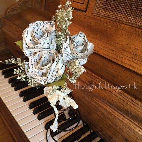 Small Sheet Music Bouquet by thoughtfulimagesink on Etsy https://www.etsy.com/listing/233300259/small-sheet-music-bouquet Sheet Music Flower Bouquet, Music Bouquet, Sheet Music Flowers, Sheet Music Wedding, Music Themed Wedding, Bouquet Arrangements, Music Themed, Grad Party, Grad Parties