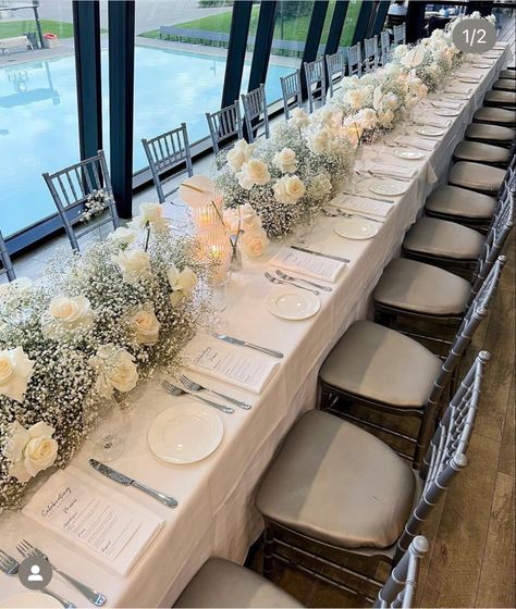 Simple White Rose Table Decor, Baby's Breath Wedding Table, Low Centerpieces Wedding Long Table, Large Head Table Wedding Decorations, Rectangular Table Decor Wedding, White Roses And Gypsophila Wedding, Rectangle Reception Tables Centerpieces, White Floral Decor Wedding, Babys Breath Table Scape