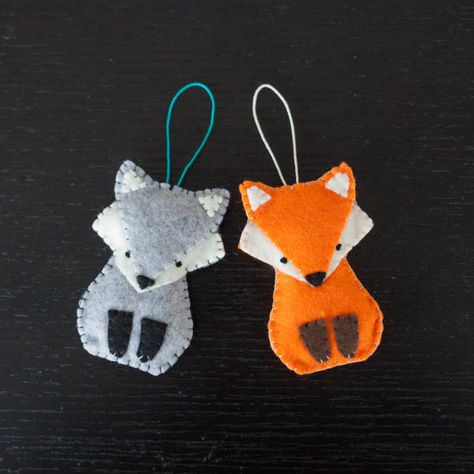 felt grey fox ornament wolf decorative ornament by ThreadAndFelt Felt Wolf, Ornament Inspiration, Fox Crafts, Felt Ornaments Patterns, Fox Ornaments, Felt Fox, Felt Christmas Decorations, Felt Ornament, Grey Fox