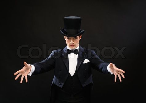 Stock image of 'magic, performance, circus, show concept - magician in top hat showing trick' Magic Trick Pose Reference, Magician Drawing Reference, Casting Magic Pose Reference Drawing, Magician Reference, Magician Pose Reference, Magician Pose, Magic Poses, Magician Outfit, Magic Pose