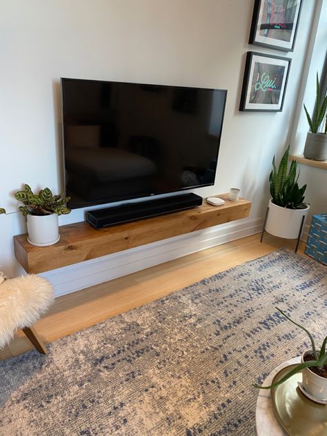 Tv On Wall Small Living Room, L Shaped Sofa Fireplace, Floating Shelves Living Room Under Tv, Mounted Tv With Floating Shelf, Mounted Tv Floating Shelf, Tv Mounted Over Floating Shelf, Floating Shelf Tv Wall Bedroom, Long Floating Shelf Under Tv, Wall Mounted Tv No Fireplace