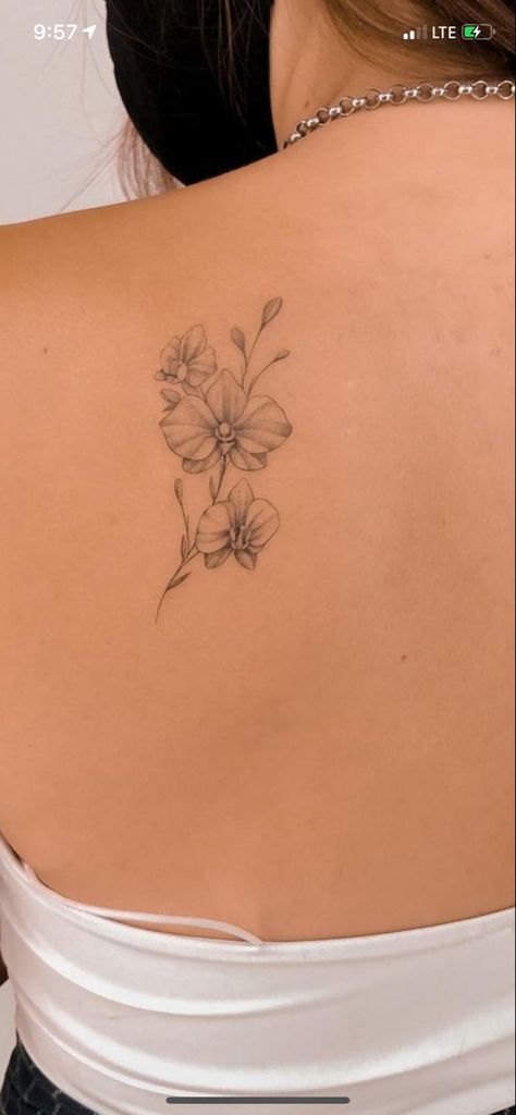 Back Orchid Tattoo, Orchid Flower Tattoos Fine Line, Orchid Tattoo Cattleya, Orkid Flower Tattoo Design, Orchid Tattoo Back For Women, Orchid Back Tattoo Women, Orchid Tattoo On Shoulder, Orchid Tattoo Wrist, Orchid Tattoo Ankle