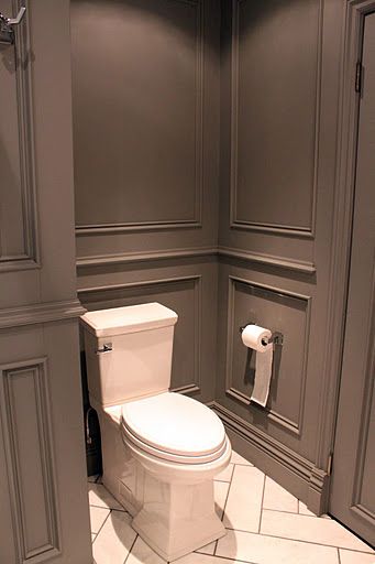 Stunning gray bathroom design features full wall gray wainscoting accented with gray moldings ... Grey Bathrooms Designs, Luxury Townhouse, Bathroom Walls, Small Farmhouse, Wall Molding, Painted Paneling, Grey Bathrooms, Wainscoting, Guest Bathroom