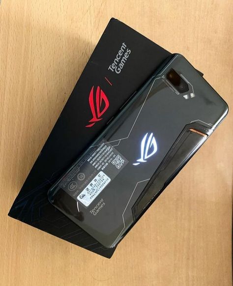 The ASUS ROG Phone II is tailor-made for Android gamers and considered "the ultimate gaming phone. The latest ASUS ROG phone also packs customizable, touch-sensitive controls with haptic feedback, dubbed AirTrigger II. Read more in BESTECH: http://tiny.cc/bfqdsz  📷(cek_tokokita) #asusrogphone2 #asusrogphoneII Asus Rog Phone 7 Ultimate, Logo Design Inspiration Sports, Hp Gaming, Augmented Reality Games, Gaming Phone, Peaky Blinders Characters, Rog Phone, Video Game Room Design, Aesthetic Letters