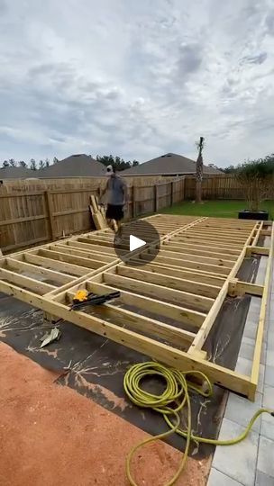 is it CHEAPER to BUILD a DECK (diy style) or to HIRE a CONTRACTOR | is it CHEAPER to BUILD a DECK (diy style) or to HIRE a CONTRACTOR?  #deck #deckbuilding #deckdesign #decking #carpentry | By Designs by Donnie | Is it cheaper to build your own
deck, DIY style, or to hire a contractor? Let's find out. But
why go small when we can go huge and save more money. Oh
yeah, in the space, this is where we're going to build it.
Starting with the layout lines, we're going to get this baby
nice and square. Before I go over the price quotes from
contractors and the cost breakdown to go the DIY route?
I wanted to take a beat and explain why I've been DIYing so
many outdoor projects lately. You see, Last year, we bought
this house and it was a boring builder-grade home although we
loved it but basically How To Build A Deck, Back Deck Ideas, Low Deck Designs, Deck Patterns, Deck Diy, Build A Deck, Platform Deck, Floating Deck, Porch Uk