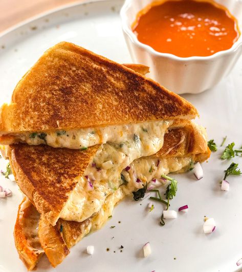 Cheese pull Masala Grilled Cheese — The Global Vegetarian Indian Grilled Cheese, Bagel Sandwich Vegetarian, Mumbai Sandwich, Hot Garlic Sauce, Cheese Pull, Sandwich Sauces, Cheese Bagels, Grilled Turkey, Bagel Sandwich