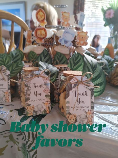 DIY Baby Shower Favors for Safari/Wild Ones theme party.

Supplies needed:
• Yogurt Jars (https://amzn.to/3OD7upN)
• Thank you tags (https://amzn.to/3y5F4Ob)
• Leaf (www.michaels.com item 10680146)
• Hot Glue (https://amzn.to/3Nvgj3K)
• 5lbs Animal Crackers (www.samsclub.com item 21044321)
• Mini Chocolates (https://amzn.to/3ucBWip) Animal Crackers Party Favors, Baby Shower Favors Diy, Animal Cracker Favors, Diy Baby Shower Favors, Safari Baby Shower Favors, Yogurt Jars, Safari Baby Shower Boy, Jungle Safari Baby Shower, Baby Shower Safari Theme