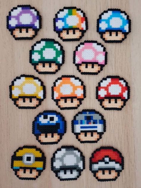 Perler Bead On Canvas, Perler Bead Mario Mushroom, Mushroom Hama Beads, Perler Beads Ideas Mario, Bad Bunny Perler Beads, Perler Beads Pokeball, Peler Bead Idea, Pac Man Perler Beads, Rainbow Perler Bead Patterns