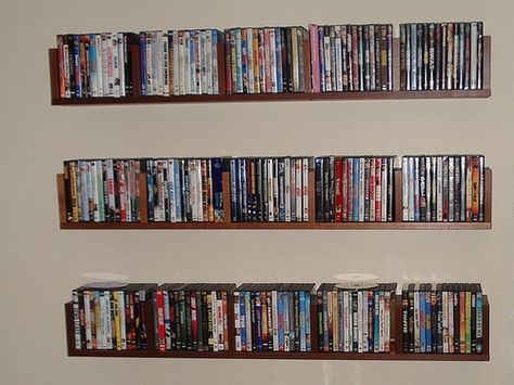 Have Too Many DVDs? Try These Clever DVD Storage Ideas for Solutions Ikea Dvd Storage, Dvd Storage Solutions, Dvd Storage Tower, Dvd Storage Ideas, Dvd Storage Cabinet, Diy Dvd Storage, Dvd Storage Binder, Diy Dvd, Dvd Storage Shelves