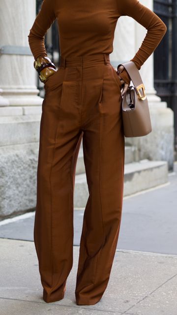 Brown With A Pop Of Color Outfit, Autumn Pants Outfit, 2023 Fashion Trends For Work, Chocolate Monochrome Outfit, Brown Color Block Outfit, Rust Monochromatic Outfit, Fall Monochromatic Nails, Rust Brown Pants Outfit, Tonal Outfits Monochrome