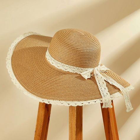 Sunshine on your mind? Our Straw & Lace Wide Brim Hat is a must-have for those sunny days ahead. It pairs delicate lace detailing with durable straw construction to keep you shaded and chic. Whether worn at the beach, a garden party, or a resort vacation, this hat offers both sun protection and a chic, summery look. Product code: CAC03C4E004HC Cheap Bohemian Wide Brim Hats, Beach Hat Casual, Vintage Hats Beach, Oversized Sun Hats, Round Hat With Brim, White Dress With Felt Hat, High Priestess Hat, Wide Brim Floppy Sun Hat, Cheap Short Brim Straw Hat For Ranch