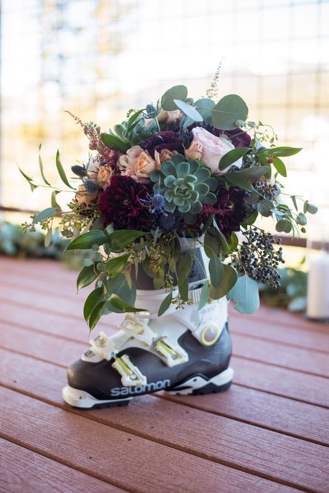 Weddings in the mountains mean ski boots are out. #MountainWeddings #FlowerSkiBoot #PetalandBean #WinterWeddings Ski Theme Wedding Ideas, Ski Boot Decor Ideas, Ski Themed Wedding Decor, Mountain Theme Decorations, Ski Centerpieces, Ski Wedding Theme, Ski Lodge Wedding Winter, Ski Baby Shower Ideas, Apres Ski Wedding