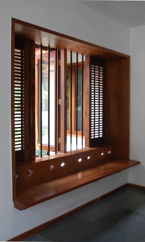 Jeena's Residence | Projects | Bhoomija Creations Wooden Windows Design Indian, Wooden Windows Ideas, Window And Door Designs, Traditional Window Design, Kerala Window Designs, Indian Wood Window Design, Window Wood Design, Window With Seating Area, Nadumuttam Ideas