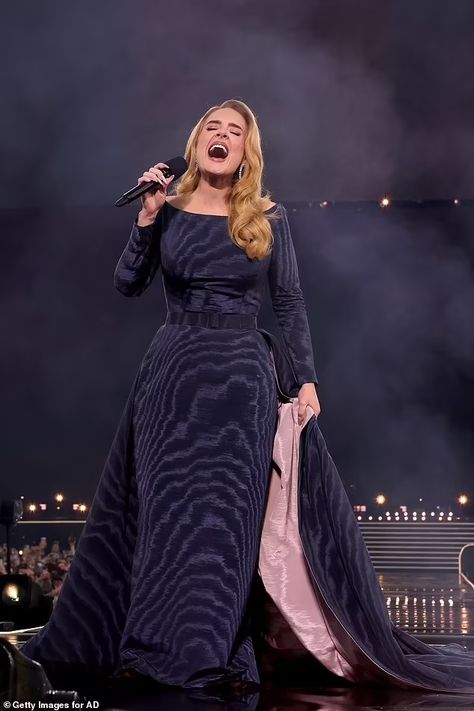 Adele PAUSES Munich concert to have part of her dress removed after torrential downpour made it 'too heavy' to wear | Daily Mail Online Adele Munich 2024, Adele In Munich, Adele Concert Outfit, Singer Outfits, Adele Wallpaper, Concert Singer, Adele Concert, Star Of The Week, Adele Dress