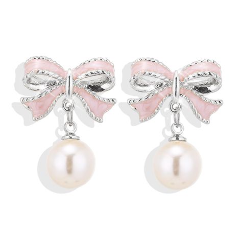 PRICES MAY VARY. 𝐁𝐎𝐖 𝐏𝐄𝐀𝐑𝐋 𝐄𝐀𝐑𝐑𝐈𝐍𝐆𝐒: Introducing our LILITHKISS Bow Pearl Earrings, a symbol of happiness and beauty. We offer a variety of styles to suit your daily needs and preferences. Wearing these dainty bow earrings will keep happiness and beauty by your side. 𝐀 𝐁𝐄𝐀𝐔𝐓𝐈𝐅𝐔𝐋 𝐌𝐄𝐀𝐍𝐈𝐍𝐆: For Christmas and, these bow earrings make a wonderful gift to send good wishes to the people around you. With their fashionable and elegant design, they can be worn not only on Pink Pearl Earrings, Teardrop Jewelry, Pearl Bow, Daily Jewelry, Faux Pearl Earrings, Birthday Jewelry Gift, Trendy Earrings, Bow Earrings, Crystal Stud Earrings