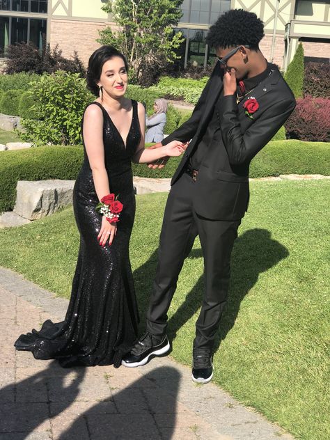 Homecoming Black And Red Couple, Prom Couples Black Outfits, Prom Guys Outfits Black, All Black Prom Dress Couple, Black Out Prom Couple, Black Suit Black Dress Couple, Black Prom Fits Couples, Red And Black Prom Couples Outfit, Black Theme Prom Couples