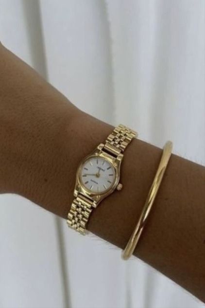 Elevate your looks with a little bit of jewelry, especially if you're a gold jewelry person. This watch & bracelet will be perfect on you. #jewelry #fashion Small Gold Watch Aesthetic, Classic Wrist Watch For Women, Gold Mini Watch, Gold Watch With Bracelets Women, Dainty Prom Jewelry, Dainty Womens Watch, Gold Woman Watch, Women Gold Watches, Gold Wrist Watch Women