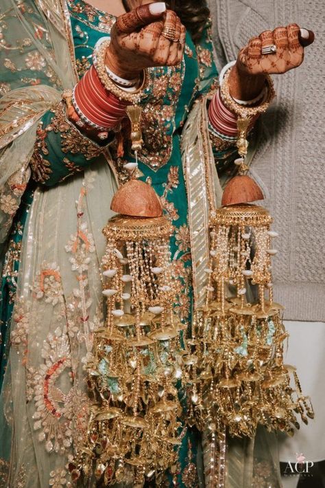 Presenting you latest bridal kalire/kaleeres for 2021 Brides. From gold bridal kalire to simple bridal kalire, we have something for every bride. #shaadisaga #indianwedding #bridalkalire #bridalkaliredesign #bridalkalireindian #bridalkalirepunjabi #bridalkalirelatest #bridalkaliregold #bridalkalirered #bridalkaliredesignsimple #bridalkalireheavy #bridalkaliresimple #bridalkaleere #bridalkaleereindian #bridalkaleerepunjabi #kaliredesign #kaliredesignbridal #kalirepunjabi #kalireunique #kalires Punjabi Kalire, Punjabi Bridal Kalire, Heavy Kaleere, Kalire Bridal Latest, Kaleere Punjabi Traditional, Kalire Bridal Punjabi, Kalire Bridal, Bride Fashion Photography, Wedding Jewelry Sets Bridal Jewellery