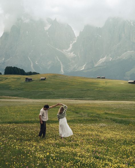 two lovers running through the meadows of the italian dolomites • • • keywords: documentary photography, cinematic photography, visual poetry, storytelling, love, couples photoshoot, tampa elopement, travel photographer, couples inspo, romcom, movie scenes, italy, dolomites, dolomites photos 🏷️ #floridaphotographer #tampaphotographer #stpeteweddingphptographer #tampaweddingphotographer #destinationweddingphotograoher #stpetephotographer #film #visualpoetry #cinematicphotographer #floridaw... Italian Dolomites Aesthetic, Couples Running Aesthetic, Dolomites Photoshoot, Film Couples Photography, Tibble Fork Reservoir Photography, Tampa Elopement, Dolomites Elopement, European Photography, Italian Honeymoon