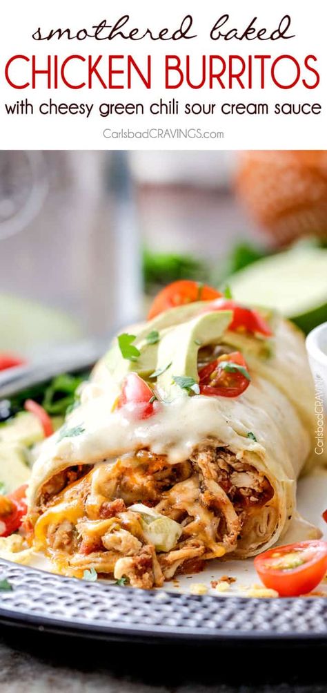 Smothered Baked Chicken Burritos AKA "skinny chimichangas" are better than any restaurant without all the calories! made super easy by stuffing with the BEST slow cooker Mexican chicken and then baked to golden perfection and smothered in most incredible cheesy green chili sour cream sauce.