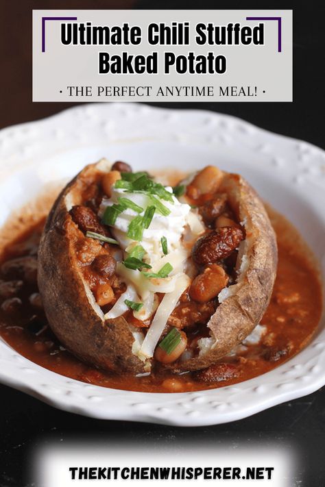 Perfectly baked potatoes fluffed up and stuffed with chili (bean or beanless), topped with 2 types of cheese, sour cream, and chives for the perfect anytime meal! Ultimate Loaded Chili Stuffed Baked Potatoes, chili baked potatoes, baked potatoes with chili, ways to use chili, ways to use up baked potatoes, baked potato bar, easy dinners, loaded baked potatoes Cornbread Filled Chili Baked Potato, Chili Stuffed Baked Potatoes, Chili Baked Potato, Chili Bake, Baked Potato Bar, Stuffed Baked Potatoes, Potato Bar, Loaded Baked Potatoes, No Bean Chili