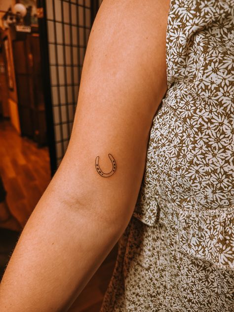 Dainty Nashville Tattoos, Nashville Tiny Tattoos, Small Horseshoe Tattoos For Women, Fine Line Horse Shoe Tattoo, Fine Line Horseshoe Tattoo, Horshoe Tatoos, Horseshoes Tattoo, Tiny Horseshoe Tattoo, Equestrian Tattoo Ideas