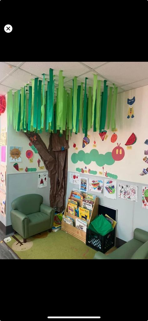 Childcare Rooms Ideas, Green Classroom Decor Theme, Storage Ideas For Classrooms, Classroom Decor Toddler Room, Diy Light Bright Wall, Daycare Art Wall, Infant Room Themes Classroom Decor, Jungle Theme Daycare Room, Waddler Classroom Ideas