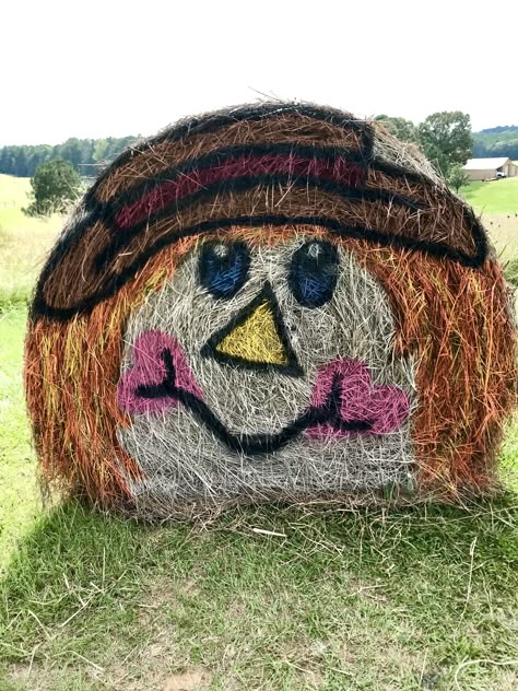 Fall 2018 Scarecrow Round Hay Bale Fall Painted Round Hay Bales, Fall Haybales, Painted Round Hay Bales, Fall Hay Bale Painting, Fall Haybale Decorating Ideas, Thanksgiving Hay Bale Decorations, Pumpkin Hay Bale Display, Painted Hay Bales Halloween, Hay Bale Art Round