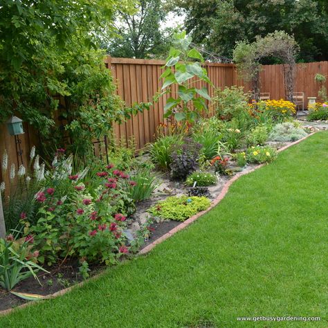 My gardens are at their peak right now, and look amazing (after hours and hours of weeding out tiny tree seedlings, darn trees!). I posted a bunch of garden pictures back in early June, and everything looks so different now. What a difference a few weeks can make. Here are some recent shots of my … Landscaping Along Fence, Farmhouse Backyard, Garden Shrubs, Fence Landscaping, Backyard Inspo, Garden Pictures, Backyard Fences, Baby Shower Decor, Wooden Fence