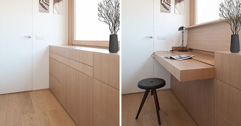 YLAB Arquitectos have hidden a desk in plain sight when they designed a small and modern apartment. The custom-made furniture piece has a hinged top, that when opened, can be used as a desk, and when more space is needed, a section of the cabinetry can be pulled out. #Desk #HiddenDesk #BuiltInDesk #InteriorDesign Pull Out Furniture, Hidden Office Cabinet, Pull Out Desk Built Ins, Hidden Built In Desk, Modern Built In Desk, Smart Desk Ideas, Pull Down Desk, Integrated Desk, Hidden Desk