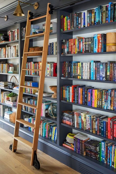 These cozy spaces are a book-lover's dream. In Home Library With Ladder, How To Build A Home Library, Small Library In House, Small House Library Ideas, Wall Library Ideas, Home Library Ladder, Farmhouse Library Room, Study Library Room Ideas, Rolling Ladder Bookshelf