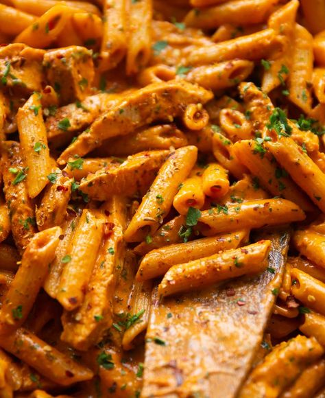 This Peri Peri Chicken Pasta is creamy, nice & spicy and loaded with so much flavour! | www.dontgobaconmyheart.co.uk Creamy Peri Peri Chicken Pasta, Peri Peri Chicken Pasta, Peri Peri Pasta Recipe, Peri Peri Pasta, Nandos Pasta, Steakhouse Pasta, Portugese Recipe, Spicy Creamy Pasta, Halloumi Pasta