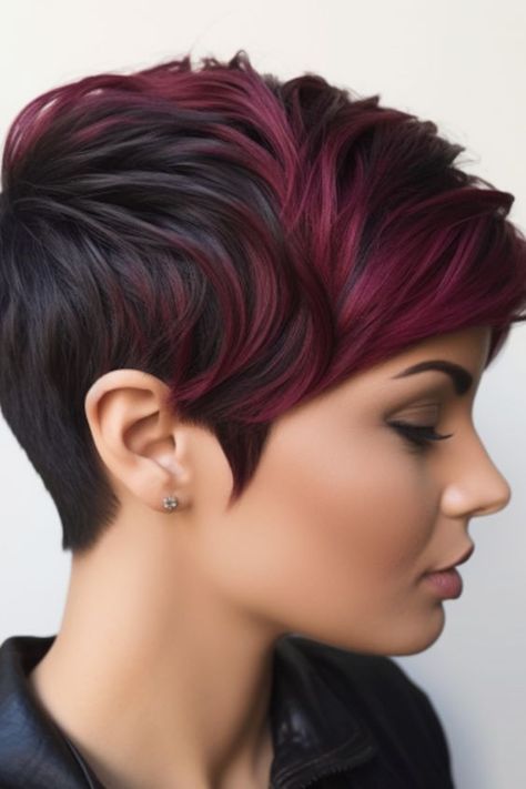 Experience the best of both worlds with a black-to-burgundy ombre pixie. Starting with jet roots, it transitions into dark burgundy tips. Click here to check out more gorgeous short dark hair color ideas. New Hair Color Ideas For Short Hair, Pixie Hair Color Ideas Highlights, Best Colors For Black Hair, Different Dark Hair Colors, Short Burgundy Hair With Highlights, Pixie Ombre Hair, Pixie Colored Hair Ideas, Short Hair With Color Ideas, Short Pixie Hair Color Ideas