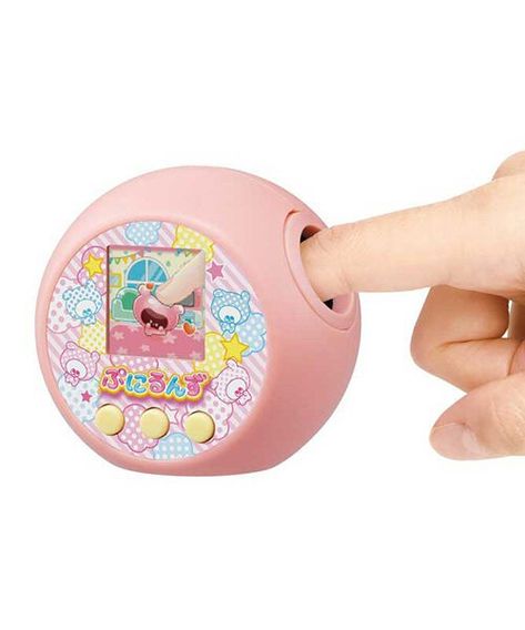 this virtual pet is like a tamagotchi that you can actually pet Kawaii Tamagotchi, Japan Kawaii, Paper Toys Template, Pink Panda, Sumikko Gurashi, Japanese Toys, Virtual Pet, Kawaii Shop, Cool Gadgets To Buy