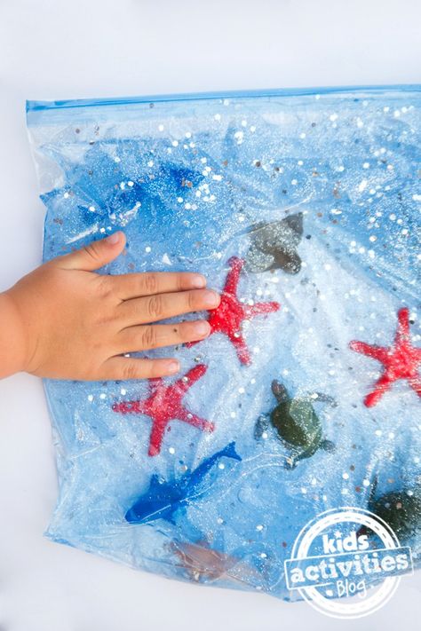 Ocean Sensory Bag - fun exploration for babies Ocean Sensory Bags, Ocean Sensory Activities, Diy Sensory Bags, Sensory Bags For Babies, Blue Activities, Ocean Sensory Bin, Ocean Activities Preschool, Ocean Sensory, Ocean Theme Preschool