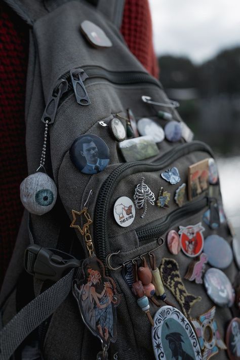 Fashion: #fashion, #style, #outfitinspiration, #beauty Pins On Bag Aesthetic, Backpack With Pins Aesthetic, Goblincore Backpack, Messenger Bag With Pins, Bag With Pins Aesthetic, Decorated Backpack, Punk Backpack, Backpacks Aesthetic, Grunge Backpack