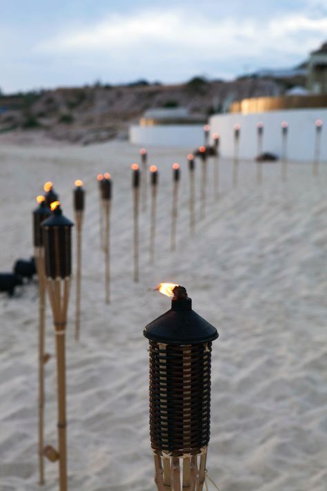 tiki torches for beach bbq Beach Bbq Party, Diy Wedding Benches, Tiki Aesthetic, St Lucia Beach, Fantasy Country, Belize Wedding, Beach Setting, Starting A Restaurant, Sunset Beach Weddings